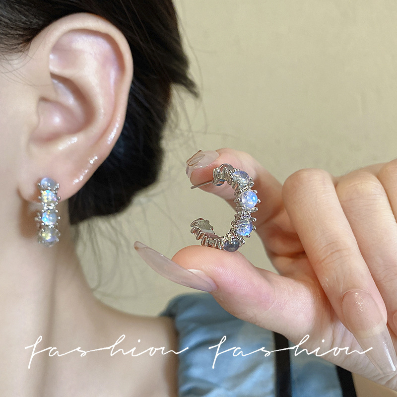Silver needle light luxury high-end earrings, moonstone liquid zircon C-shaped circle stud earrings, high-end exquisite and personalized earrings Application Scenario