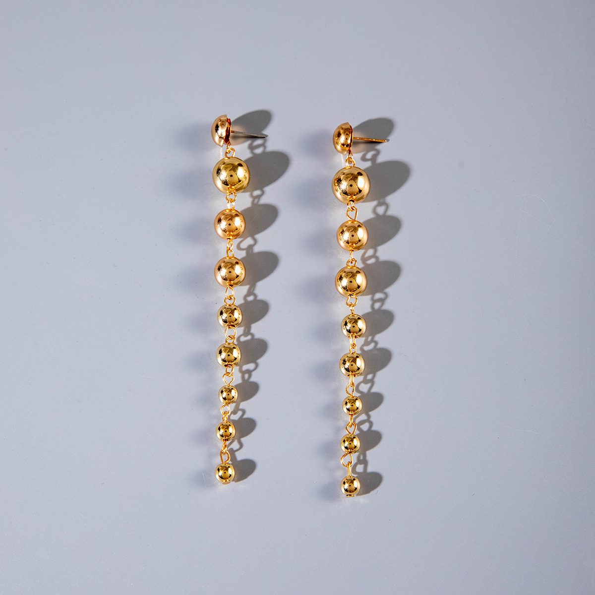European and American cross-border jewelry, fashionable and retro CCB personalized metal round bead geometric tassel long earrings and pendants for women Item Picture