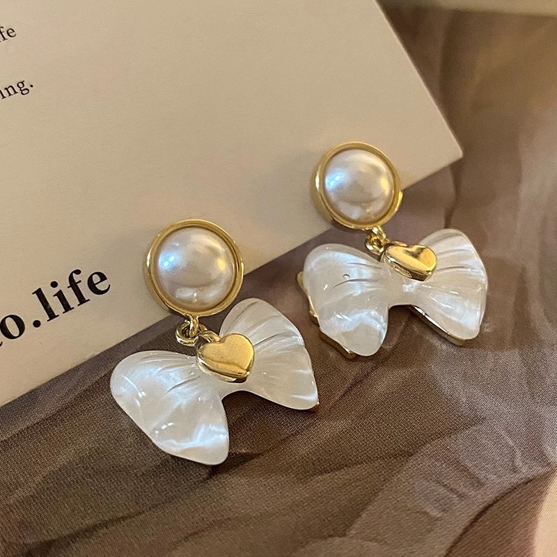Wholesale of 925 silver needle exquisite French bow earrings and stud earrings with a niche design sense, elegant and high-end style details Picture