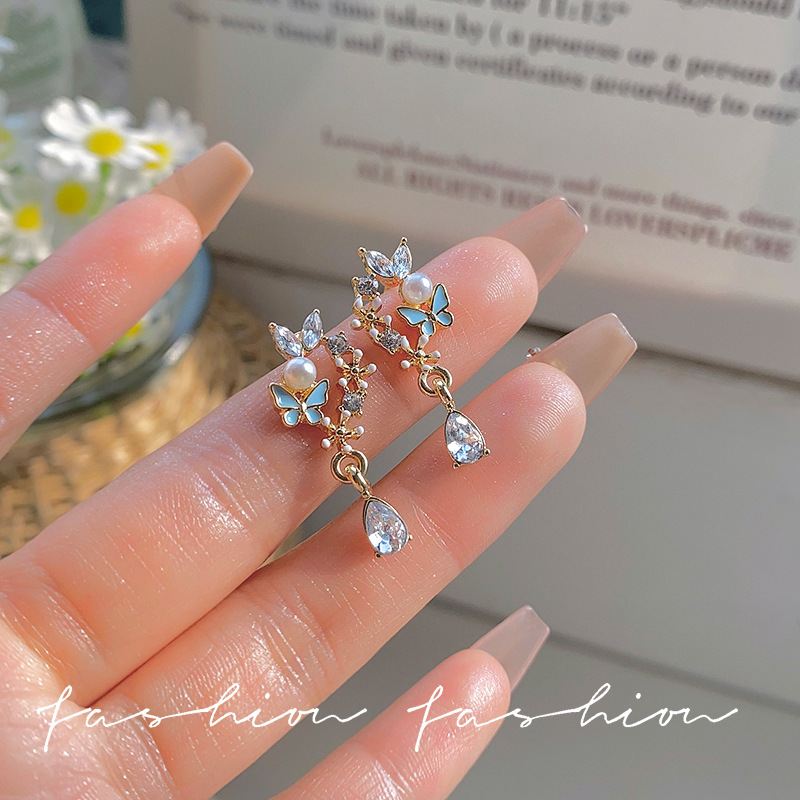 Silver needle elegance, butterfly flower pearl earrings, light luxury, niche stud earrings, women's earrings, high-end feel, Yiwu accessories wholesale Specification drawing