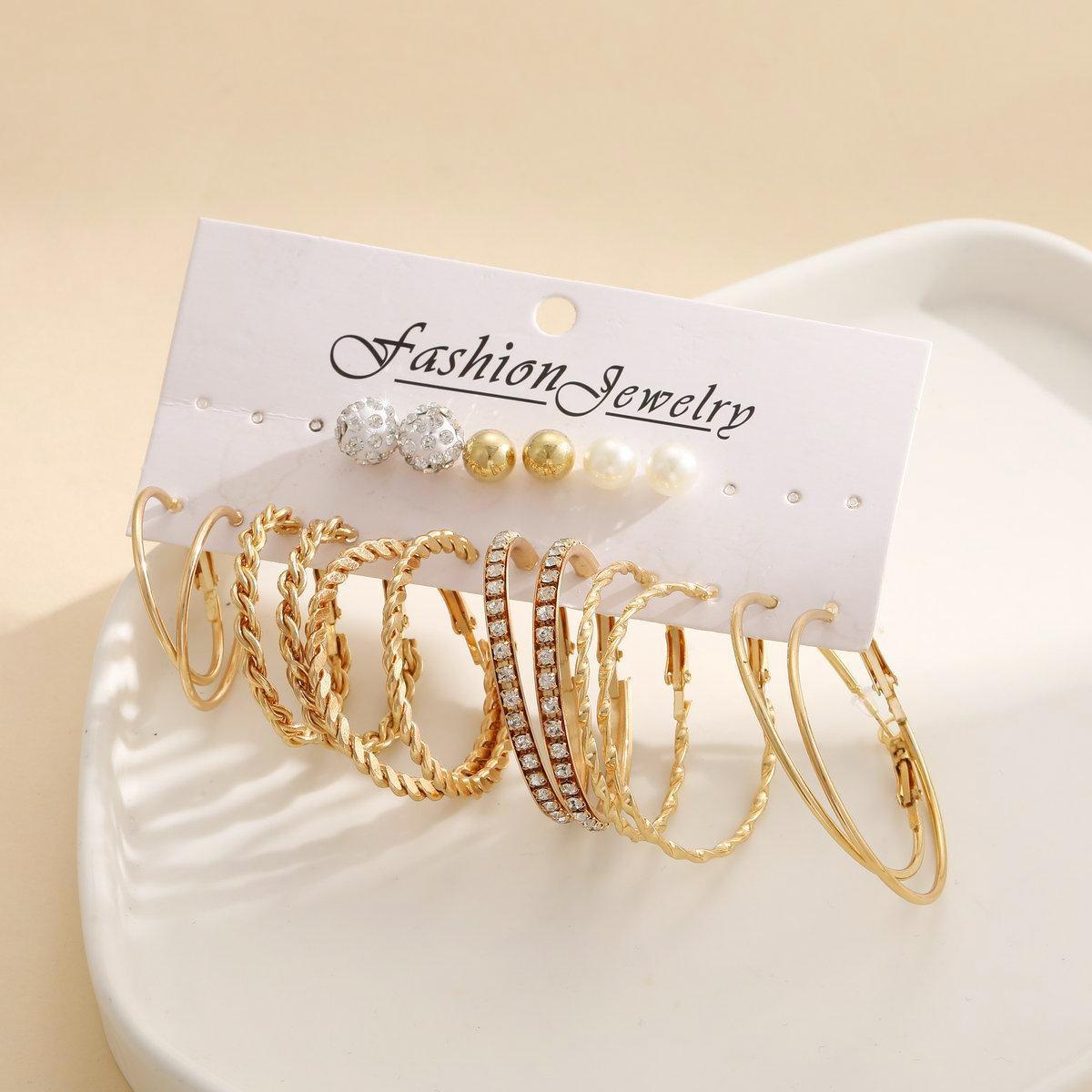Cross-border new retro C-shaped earring set: 9 pairs of creative and personalized geometric twist earrings and heart-shaped female butterfly earrings Application Scenario