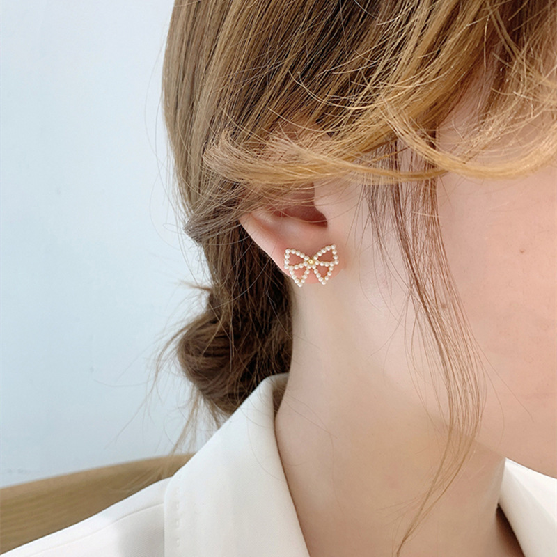 S925 silver needle, exquisite and elegant, pearl bow stud earrings, small and sweet, cross-border supply, fashionable earrings for women full figure