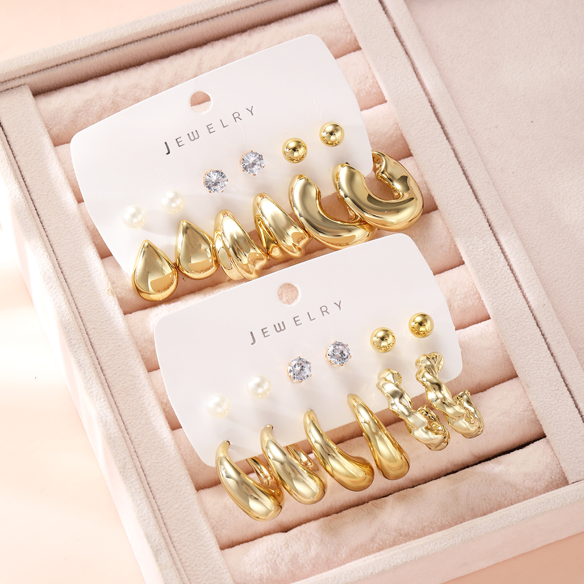 A new 12-piece set of cross-border European and American fashion, simple and high-end style, unique C-shaped irregular water drop diamond earrings for women Application Scenario