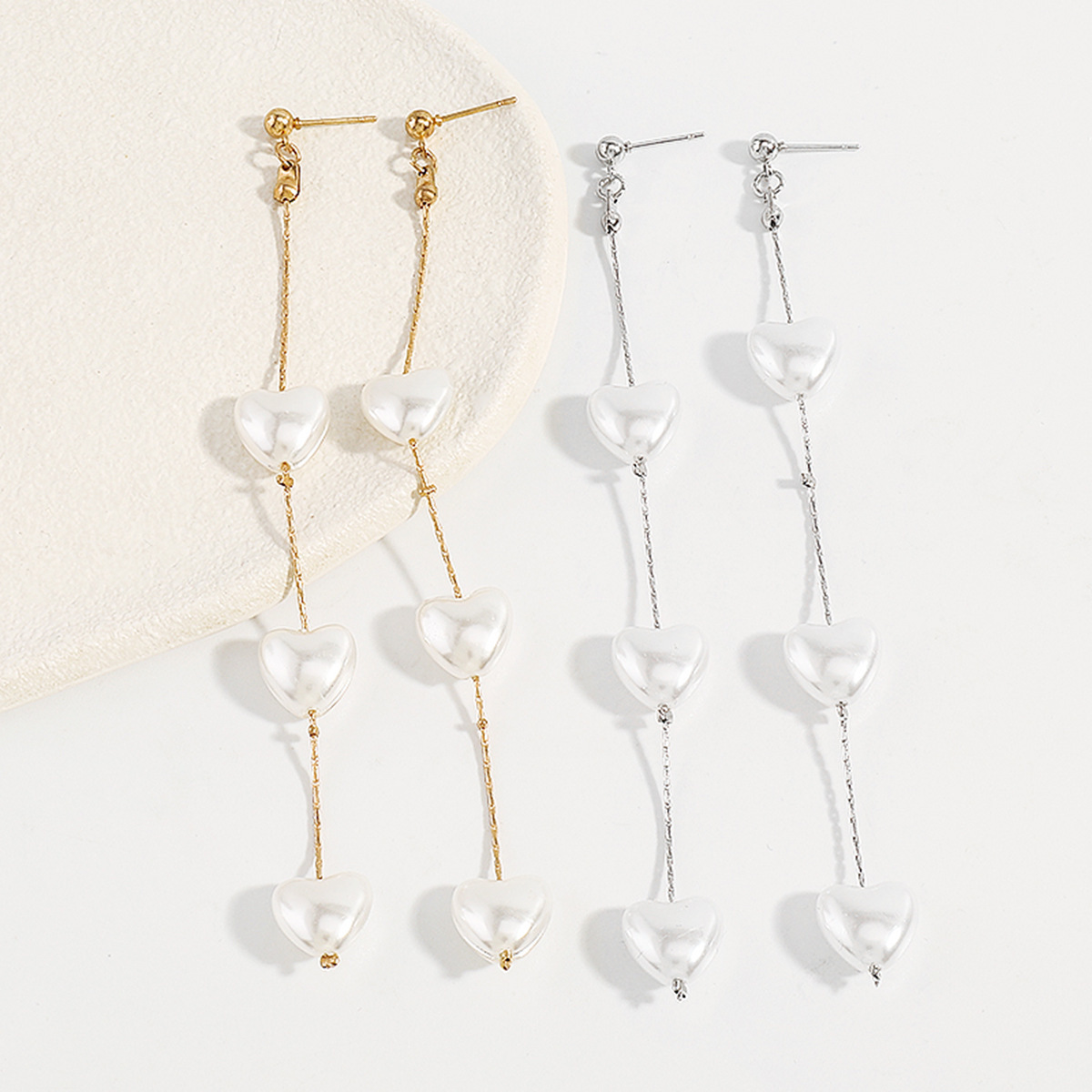 French unique and niche style earrings, long pearl heart-shaped earrings, cold and elegant earrings for women Application Scenario