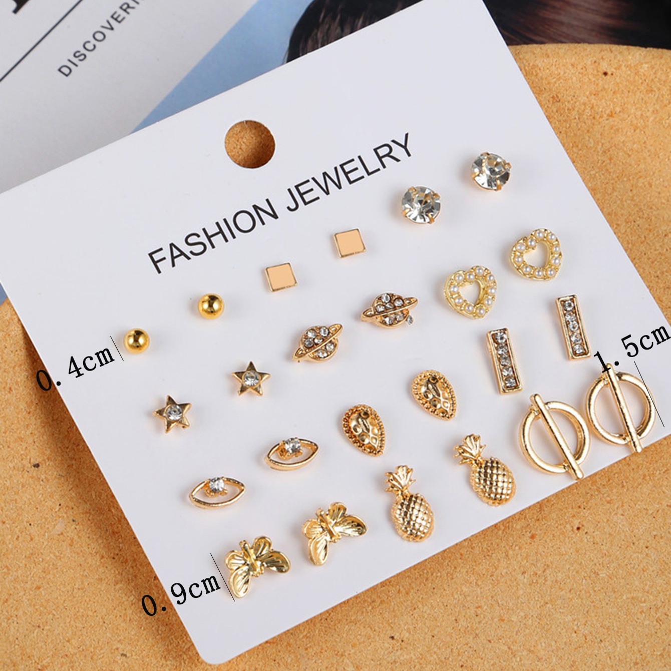 A 12-piece set of creative and simple pineapple teardrop stud earrings in an ins style with diamond hearts, starry sky eyes and geometric stud earrings details Picture