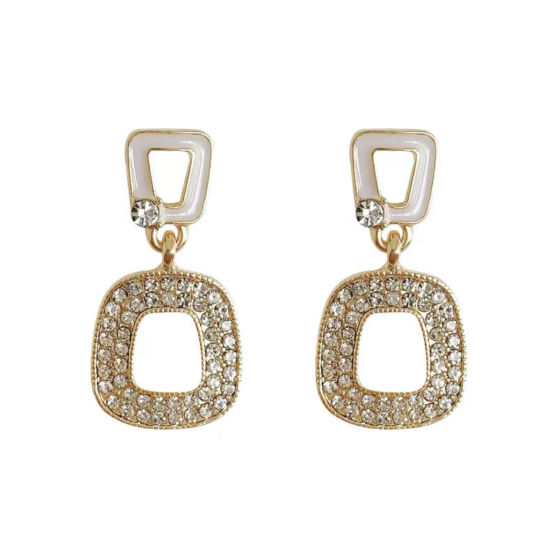 The S925 silver needle personalized hollowed-out geometric micro-set diamond earrings feature a unique and exquisite design, exuding a fashionable and elegant charm Item Picture