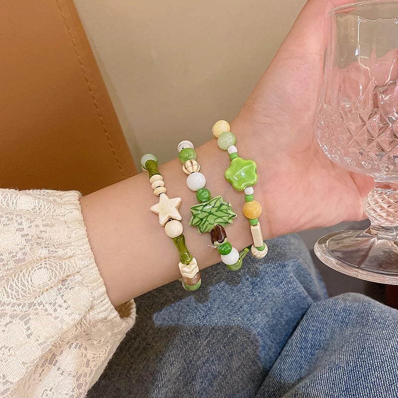 Forest-themed white and green coconut tree beaded bracelet, a unique and exquisite design for women, exudes a sense of high-end luxury and fashion, and is a versatile accessory Specification drawing
