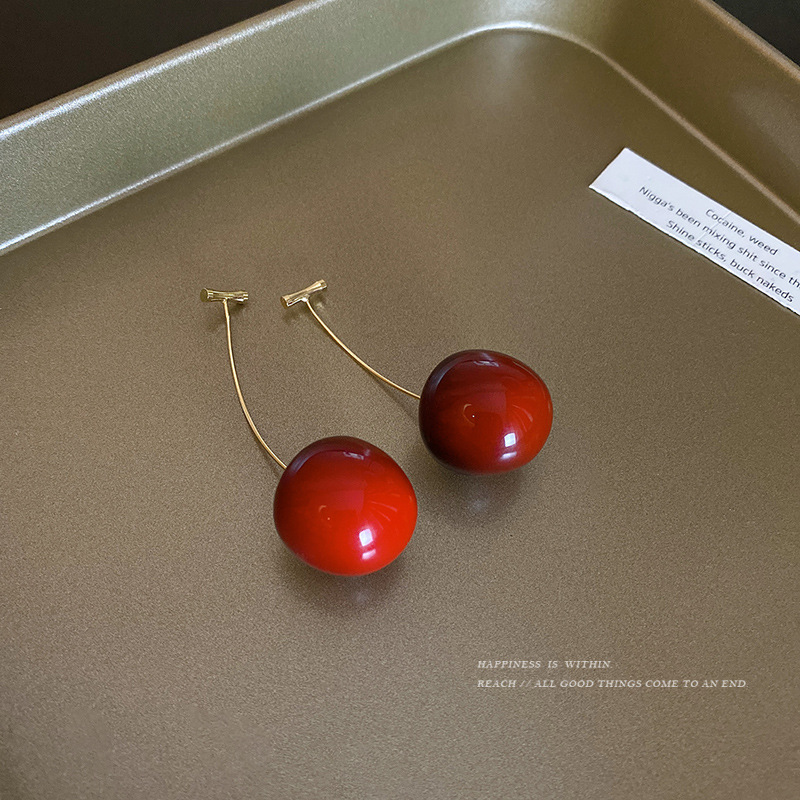 Korean Instagram pastoral windmill cherry earrings, a unique long pair of earrings, are fashionable and elegant earrings that are popular on the Internet Specification drawing