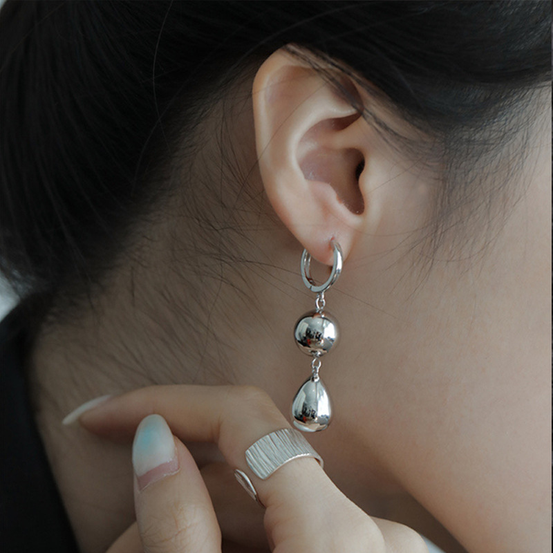 European and American cold style silver round ball temperament earrings, ins heavy industry bell earrings, niche design sense, exaggerated ear buckles details Picture
