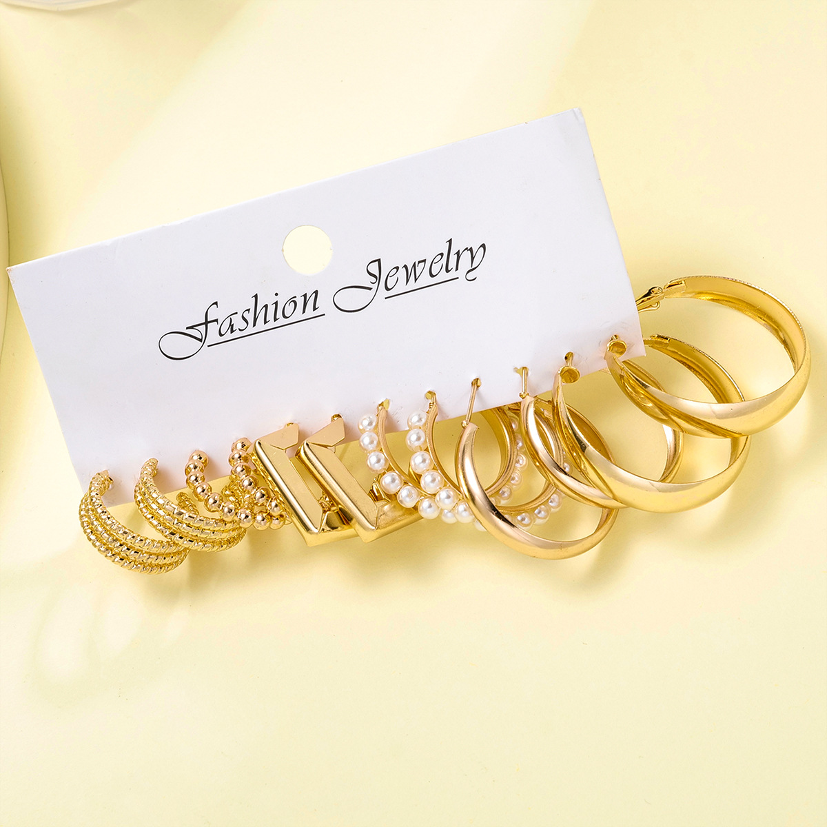 A new 6-piece set of high-end C-shaped geometric earrings with creative and fashionable golden twist earrings from Europe and America Application Scenario