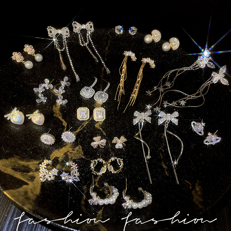 S925 Silver needle micro-inlay zircon tassel earrings, high-end, light luxury, niche ear studs, elegant earrings and earrings for women wholesale details Picture