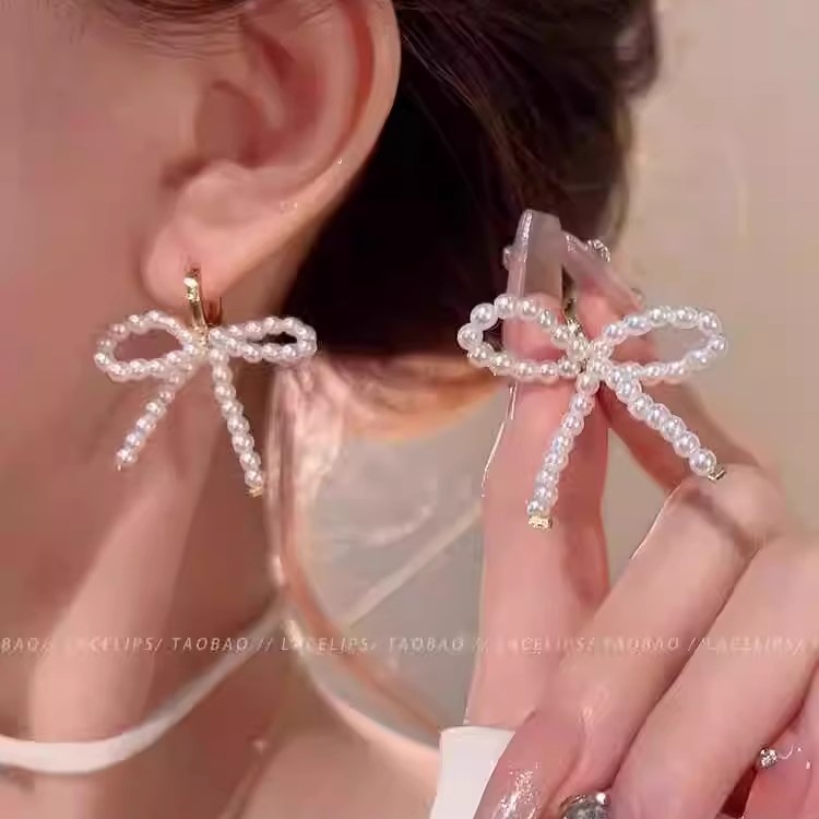 French elegant style bow pearl earrings 2025 new bestseller, high-end earring, women's retro earrings and pendants full figure