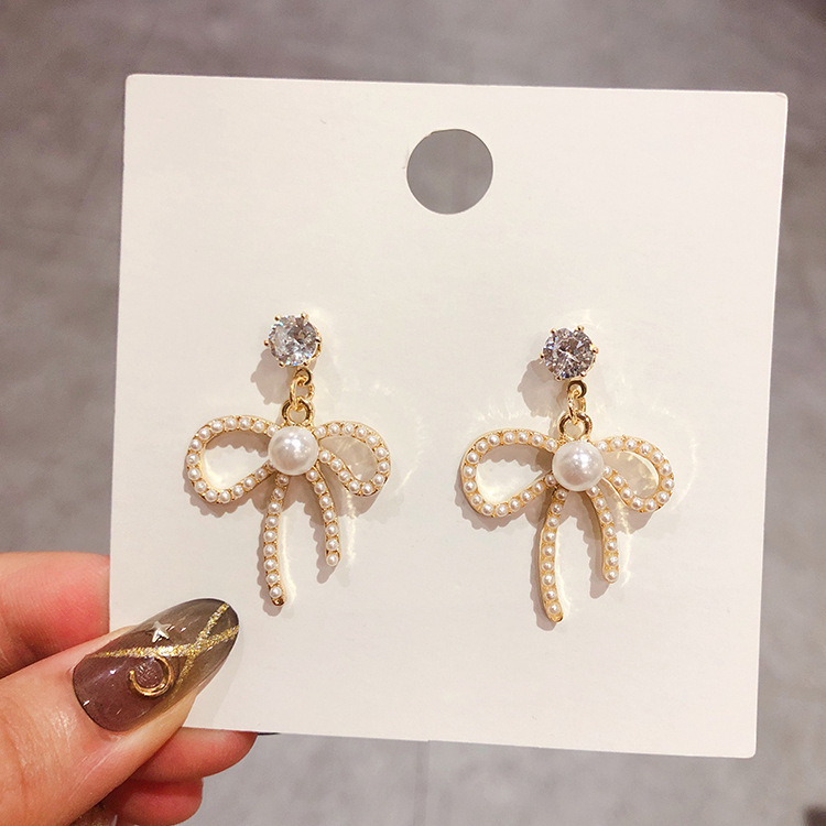 Wholesale of bow earrings, long tassel pearl earrings, stud earrings and other earrings for women in Dongdaemun, South Korea full figure