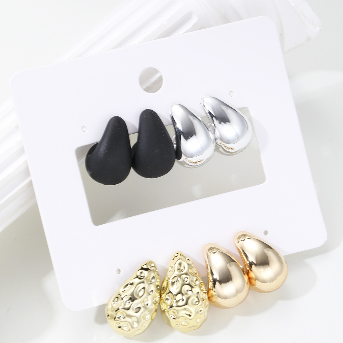 A new set of 4-piece cross-border light luxury mixed-color water drop bean earrings with full management in Europe and America, featuring a fashionable, elegant and simple style Application Scenario