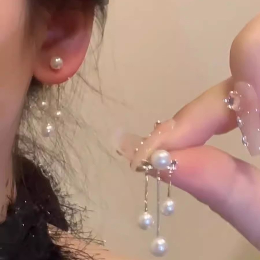 Tassel pearl earrings for women, French light luxury style, niche design, high-end feel, new 2025 best-selling stud earrings full figure