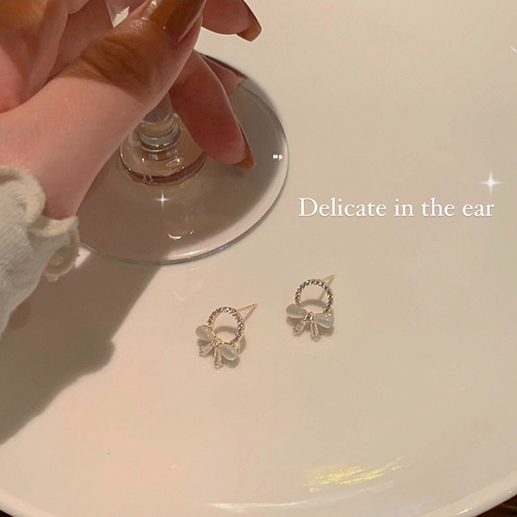 S925 Silver Needle small and exquisite cat's eye stone bow stud earrings for women, simple and personalized circle diamond earrings wholesale details Picture