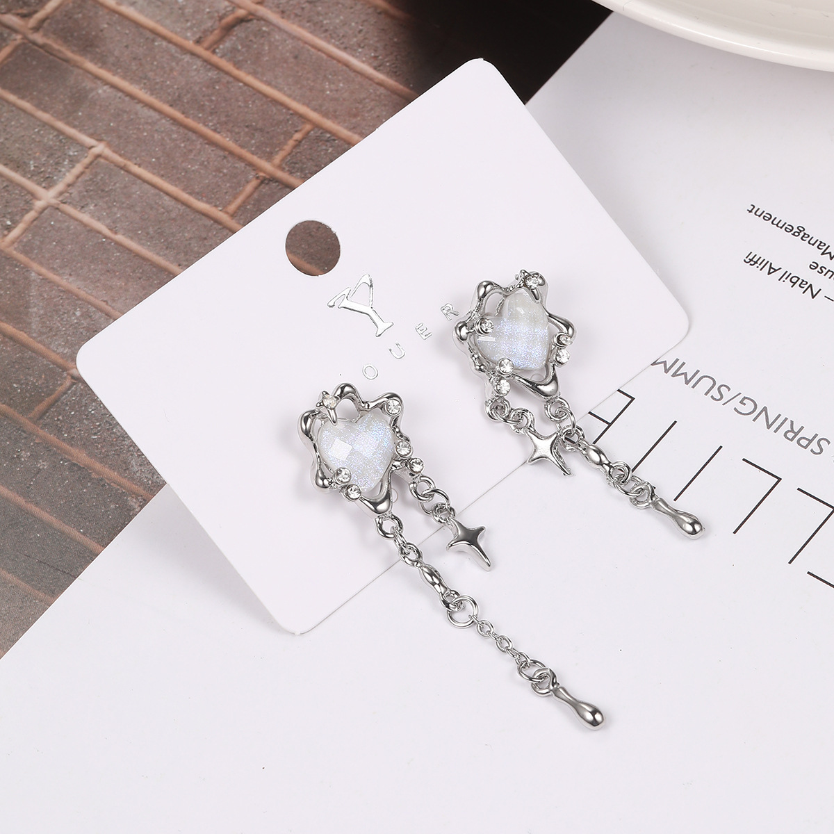 Cross-border heart-shaped four-pointed star tassel earrings, light luxury and niche ins style, sweet and cool, high-end and personalized earrings Application Scenario