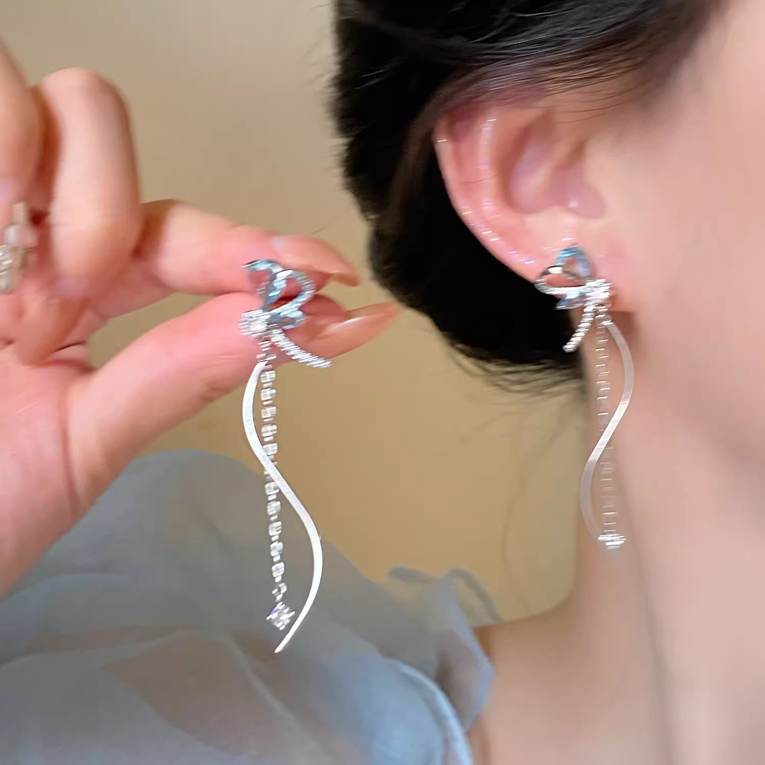 Cold style butterfly tassel earrings, a niche design for women, fashionable and versatile stud earrings, a light luxury and high-end versatile ear accessory Specification drawing