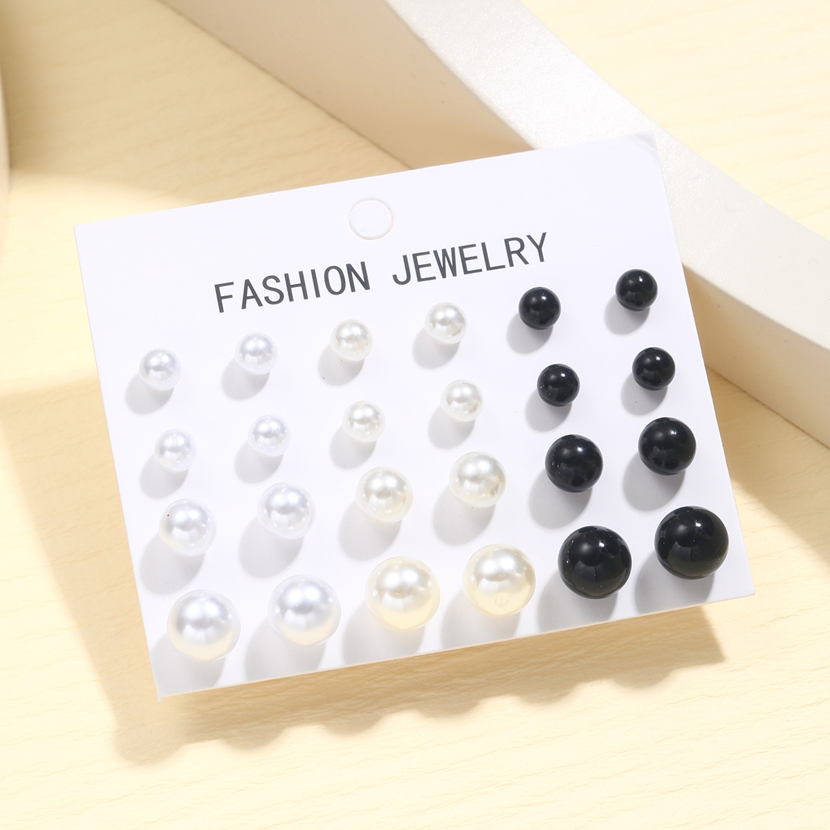 A new 12-piece set of simple European and American earrings for cross-border use, featuring a high-end retro three-color imitation pearl stud design Specification drawing
