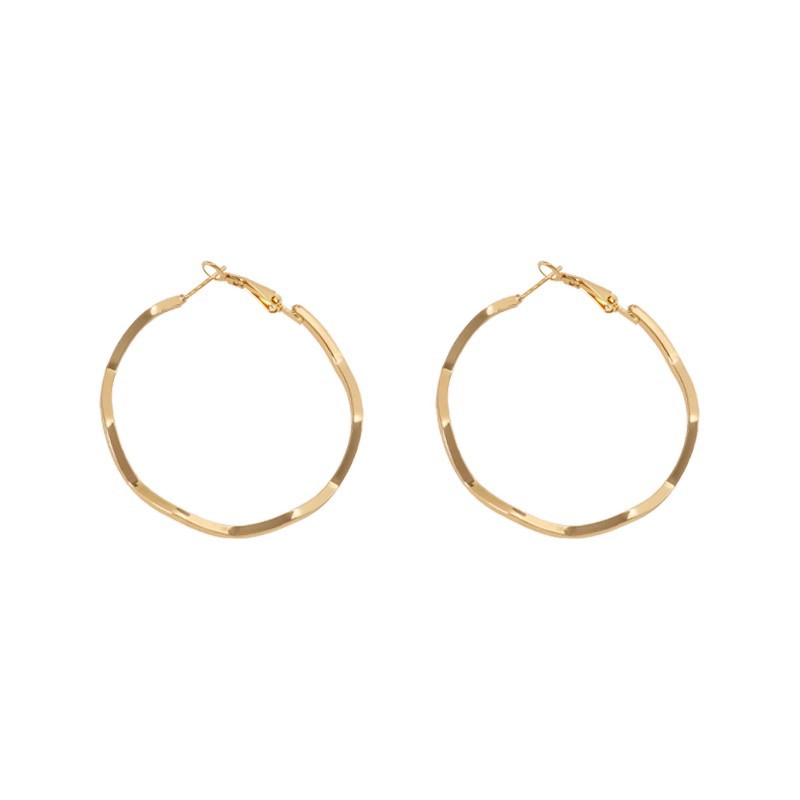 Golden-textured large circle earrings exude a sense of sophistication and simplicity for women. Exaggerated circle earrings with a niche design feel Item Picture