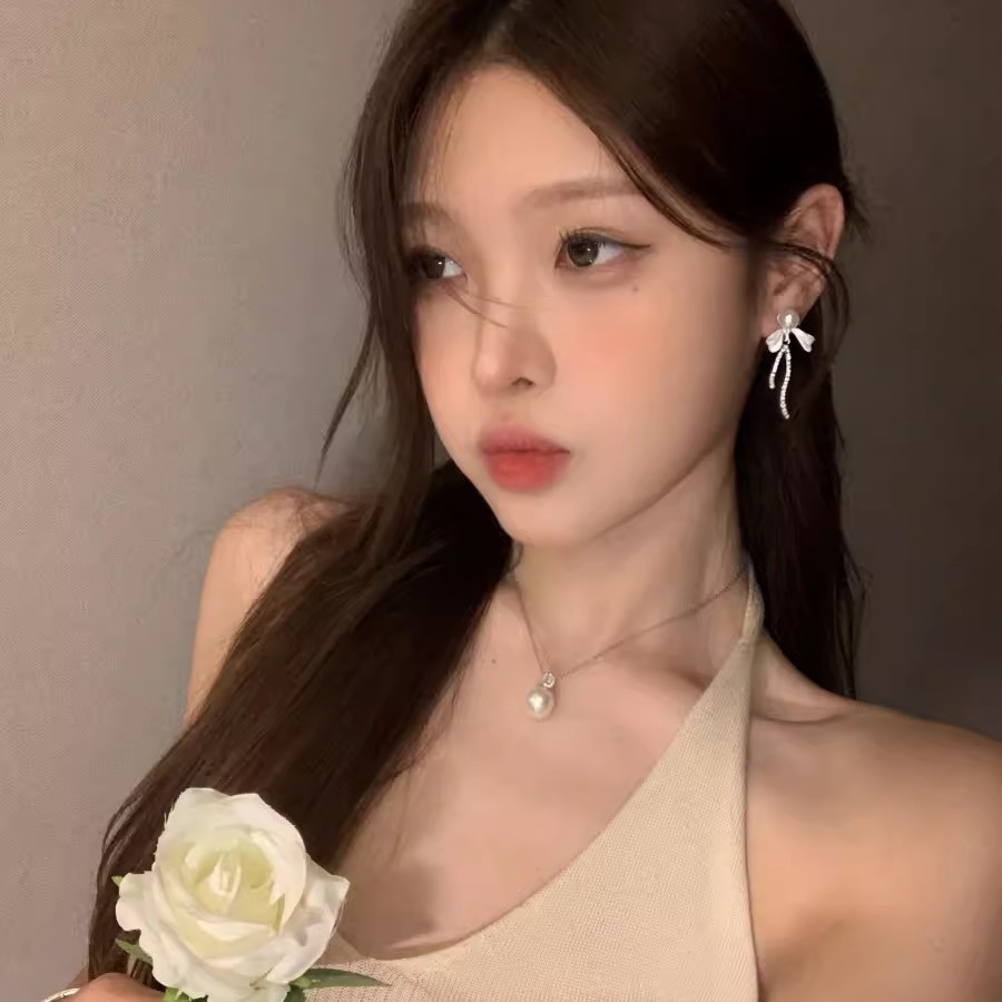 Bow pearl long tassel earrings for women, a light luxury and high-end style, fashionable stud earrings, versatile and elegant earrings details Picture