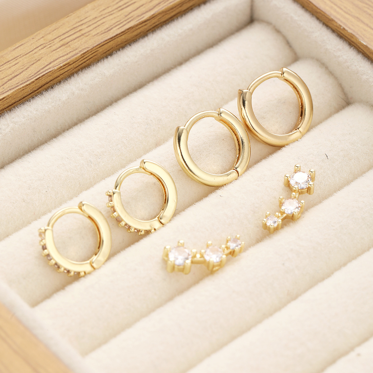 Amazon's new zircon copper-plated real gold earrings 3-piece set with stud earrings, a light luxury and high-end women's ear accessory wholesale in Yiwu Application Scenario