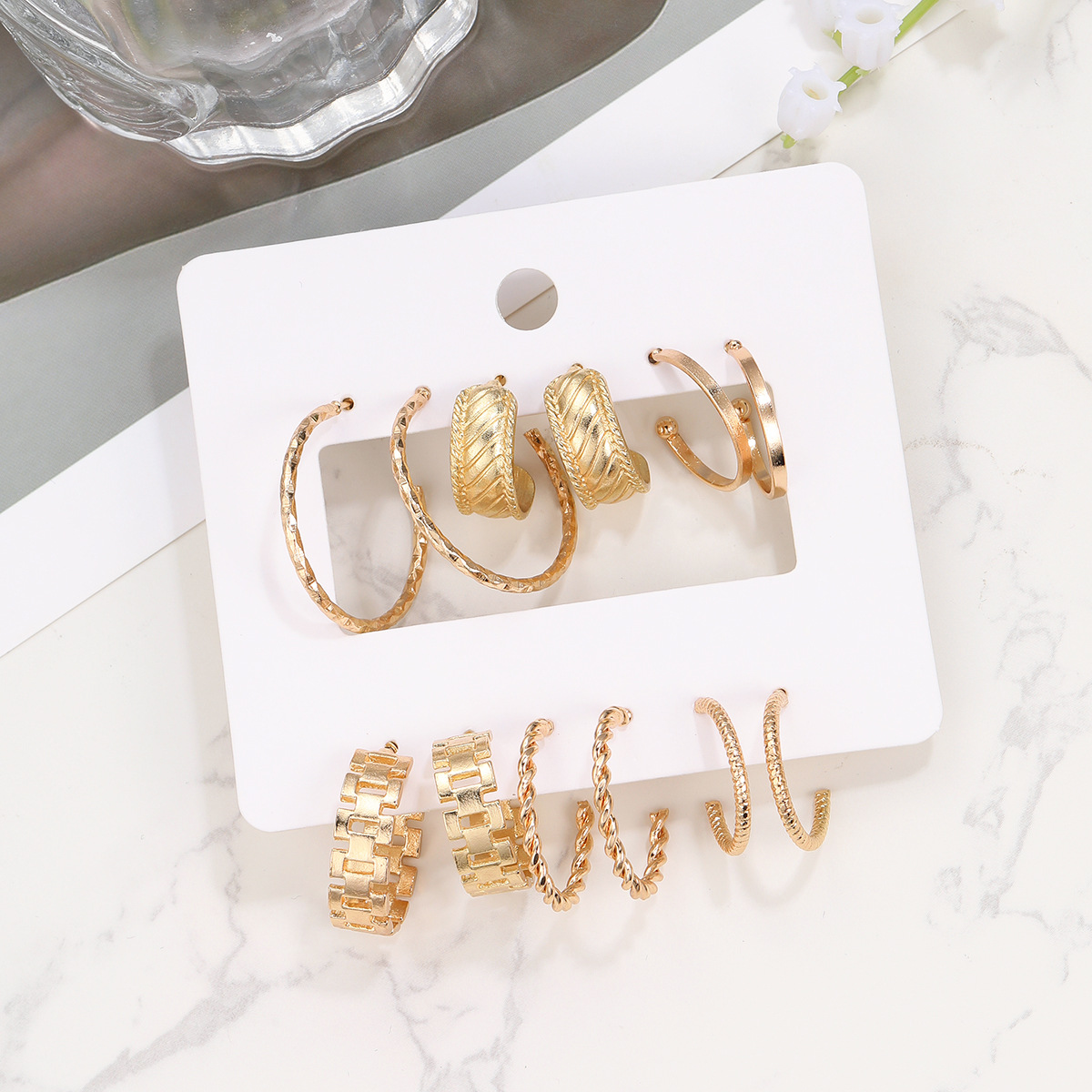Wholesale of 6-piece cross-border new ins creative and simple C-shaped chain hollowed-out earrings with European and American metal ear rings Application Scenario
