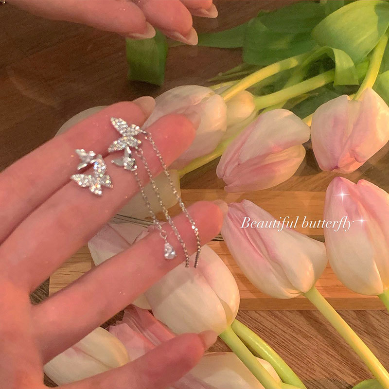 Long asymmetrical butterfly tassel earrings, a niche design for women with a high-end and light luxury style, are popular ear accessories Specification drawing