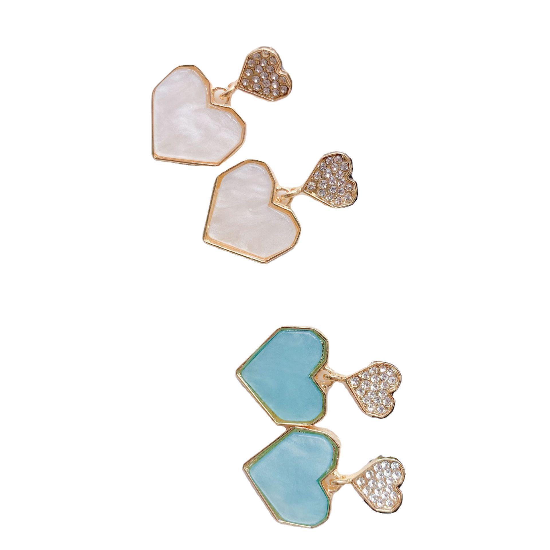 S925 Silver needle simple geometric heart-shaped earrings, internet-famous style, versatile earrings, micro-set sparkling diamonds, super fairy earrings wholesale Item Picture