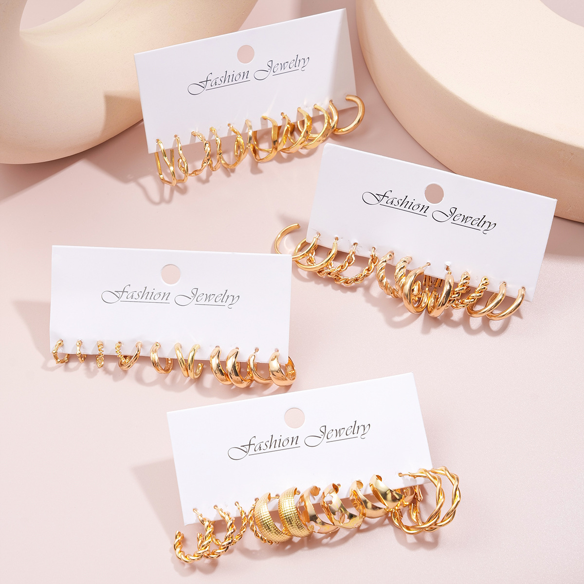 A new 24-piece set of cross-border metal C-shaped alloy heart-shaped earrings from Europe and America, featuring creative geometric twisted ear loops Specification drawing