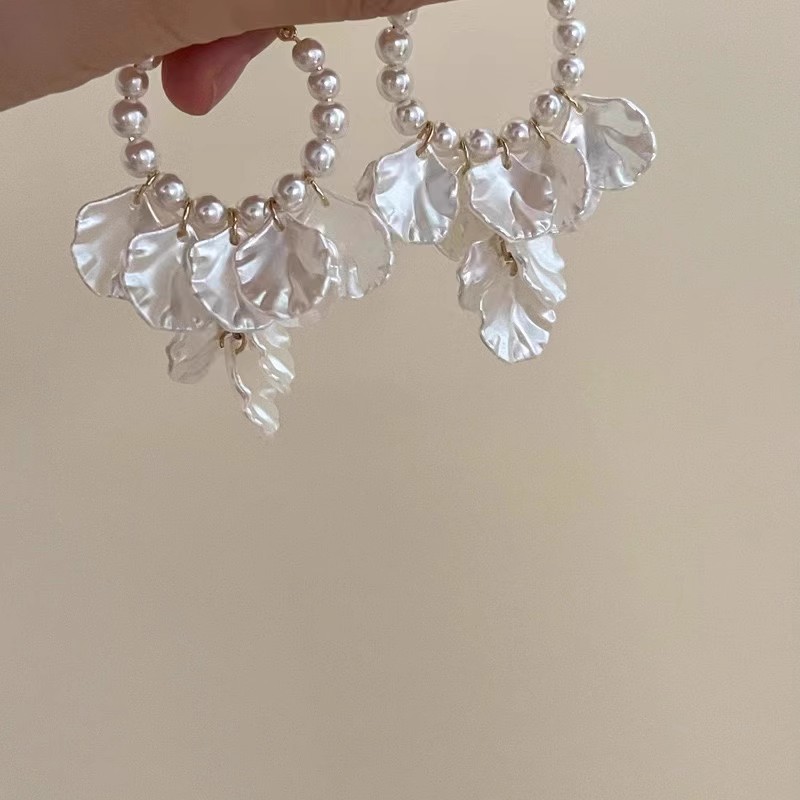 Resort-style French retro pearl petal tassel earrings, women's light luxury high-end long exaggerated stud earrings details Picture