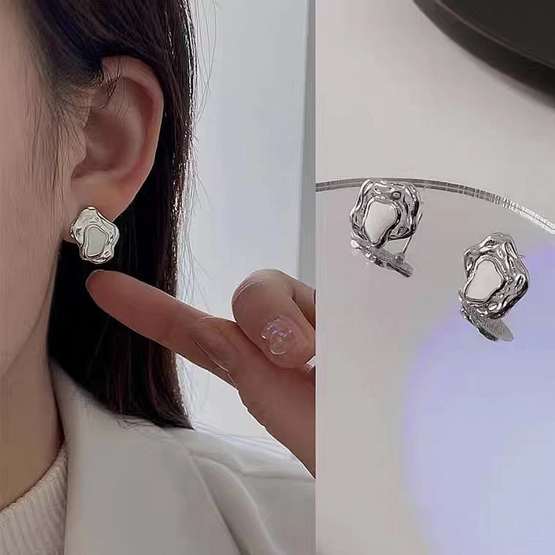 S925 Silver needle, a niche design sense earring, a cold and elegant aurora flowing irregular stud, a small and stylish ear accessory full figure