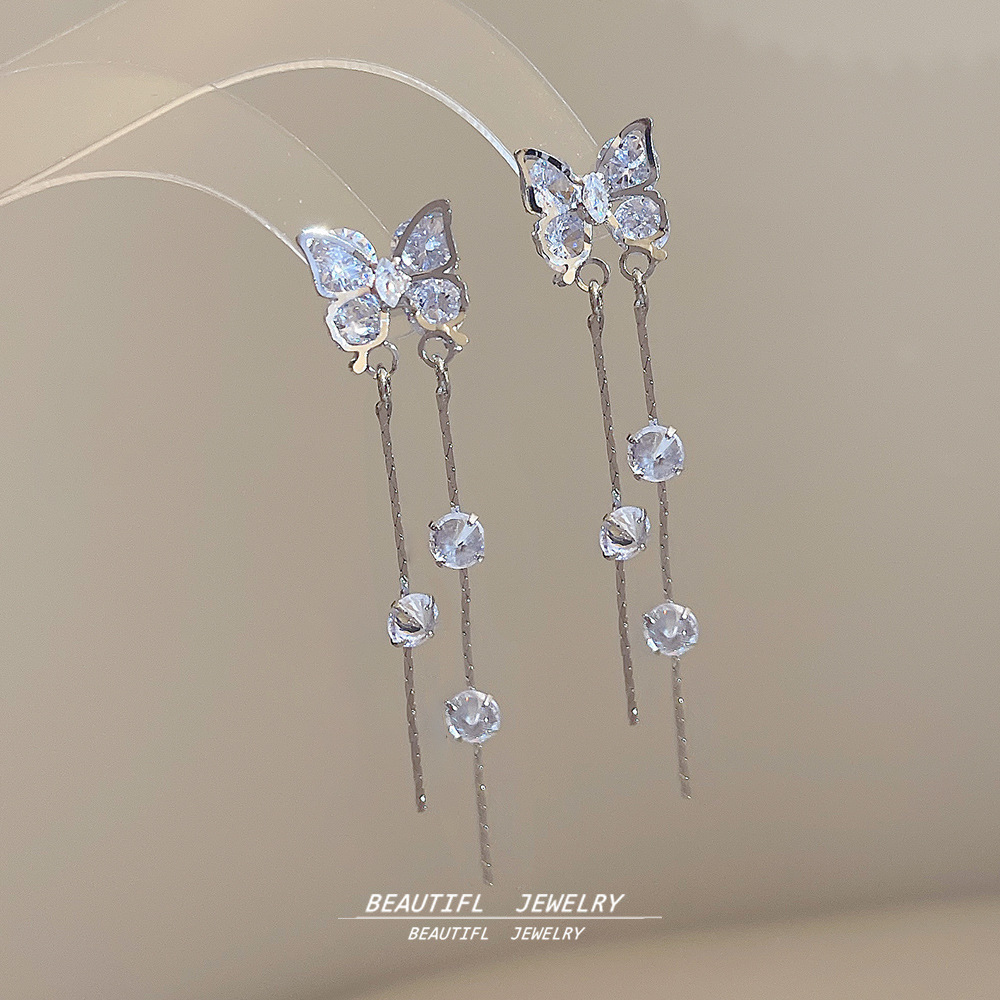 Korean style simple and elegant long tassel earrings, female Internet celebrity style light luxury bow earrings, exquisite and individual earrings full figure