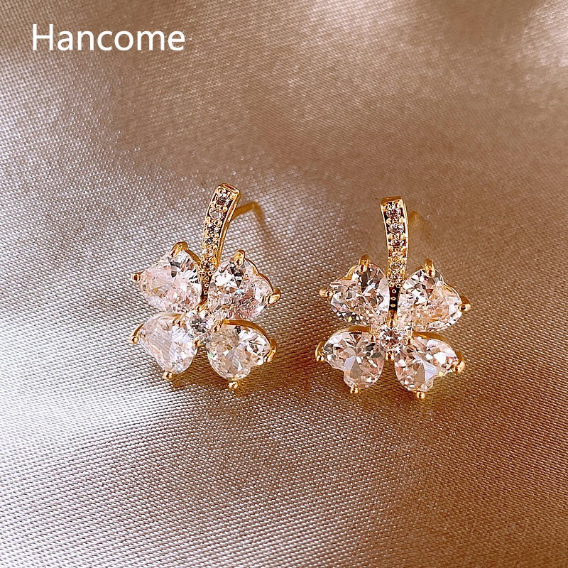 Exquisite and light luxury clover earrings, women's niche design stud earrings, 2022 new trendy and high-end earrings full figure