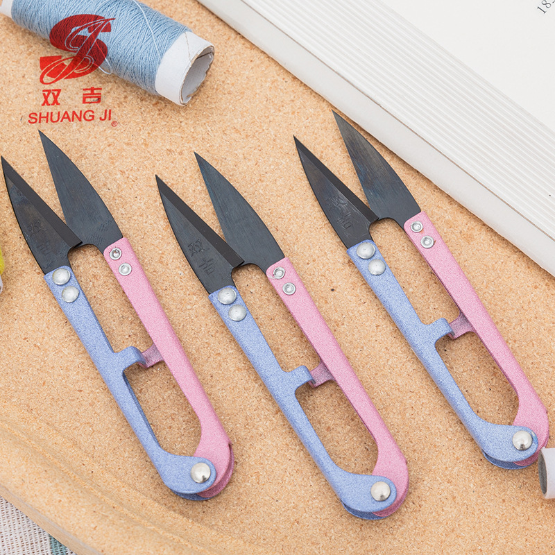 A small pair of scissors for cutting thread ends, a tailor's U-shaped scissors for thread cutting, a special yarn scissors for cross-stitch, sewing scissors for household use details Picture