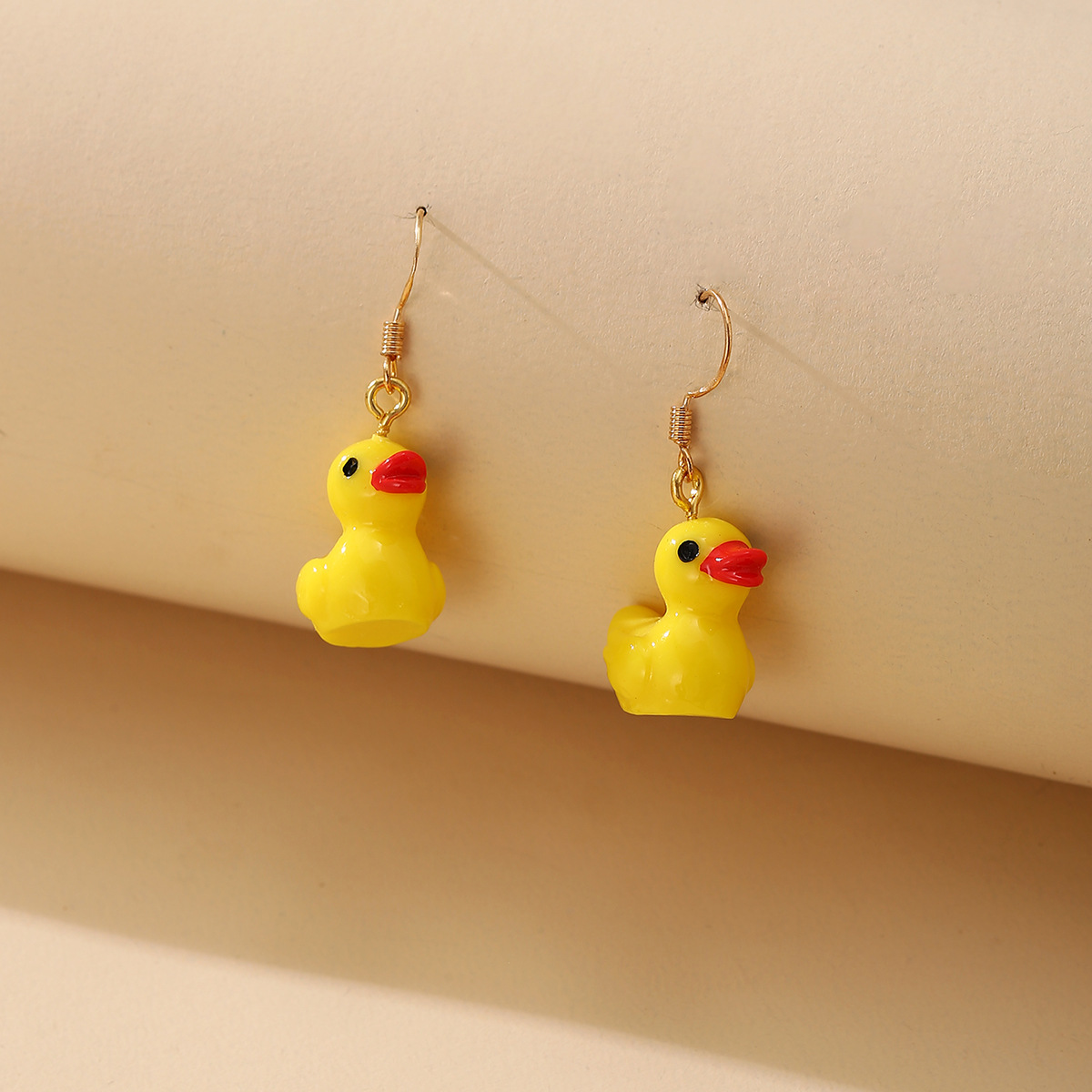 Korean fashionable and sweet little yellow duck stud earrings, long and individual exaggerated Korean-style earrings, lemon yellow elegant female earrings full figure
