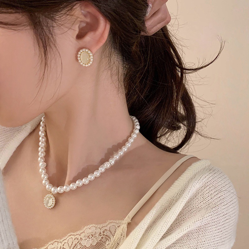 French retro cat's eye pearl necklace with a unique and high-end feminine charm, court-style neckchain, 2024 bestseller, collarbone chain trend Specification drawing