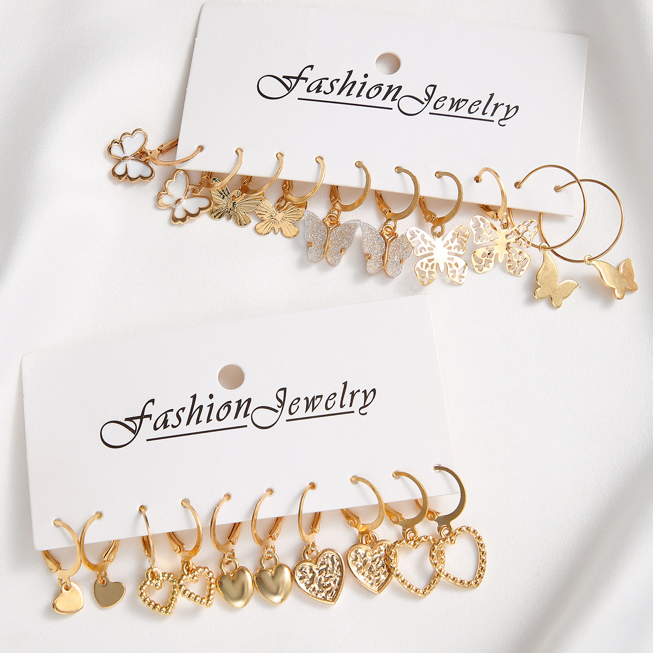 A 10-piece set of creative, retro and simple hollowed-out heart-shaped golden butterfly ear buckles from Europe and America Specification drawing