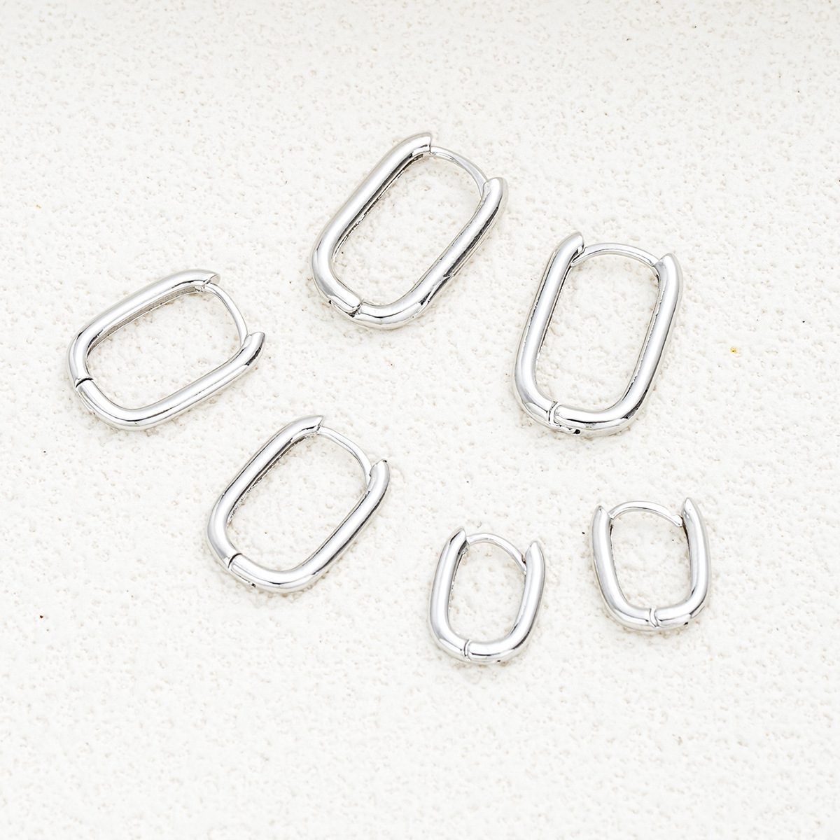 A set of 3-piece square copper ear buckles for cross-border trade in Europe and America, featuring geometric creativity and simplicity, is a bestseller for women on Amazon Application Scenario