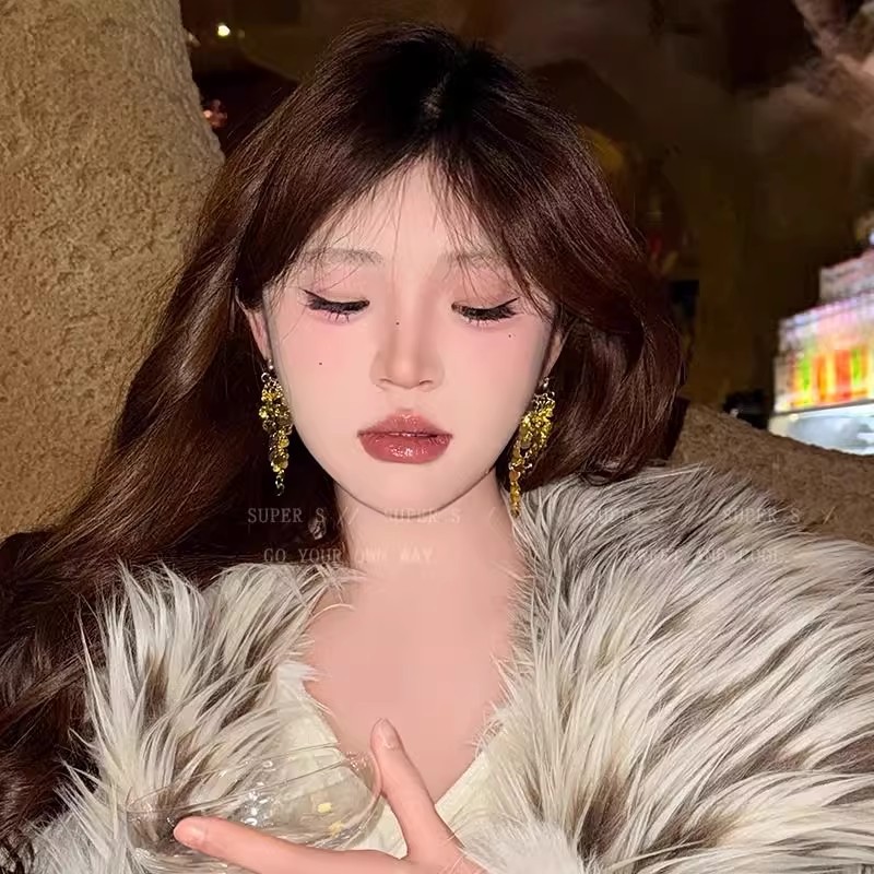 Shine on the stage! Golden sequined tassel earrings, women's light luxury, niche high-end stud earrings, exaggerated and grand metal earrings details Picture