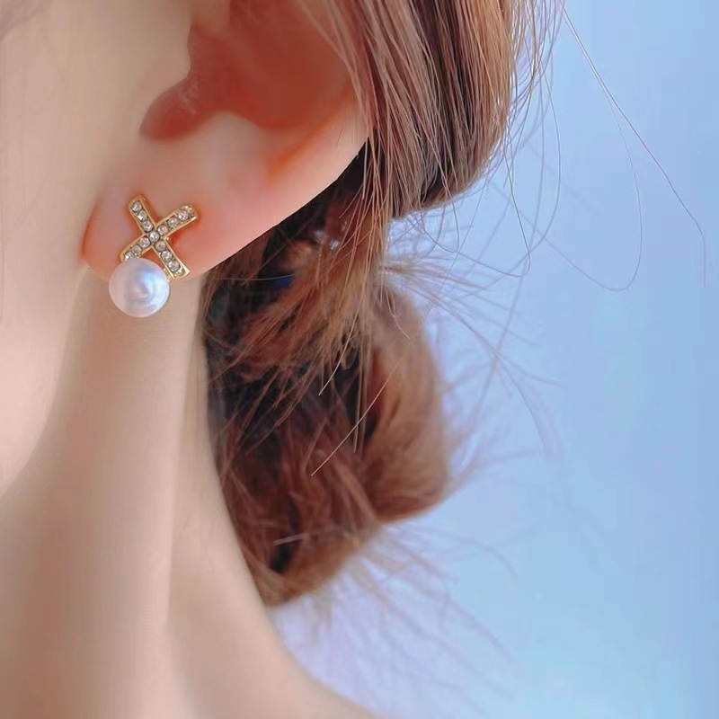 Cross-pearl stud earrings with silver needles, small and stylish earrings for Korean women, popular for women in 2024 details Picture