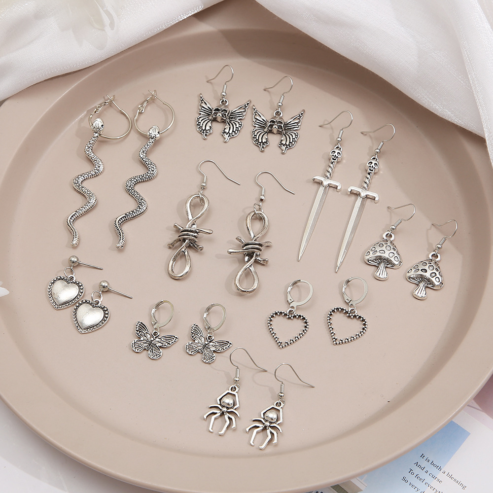 Wholesale of 9-piece retro alloy earrings from Europe and America, featuring creative butterfly, heart, mushroom, snake and spider pendants Specification drawing