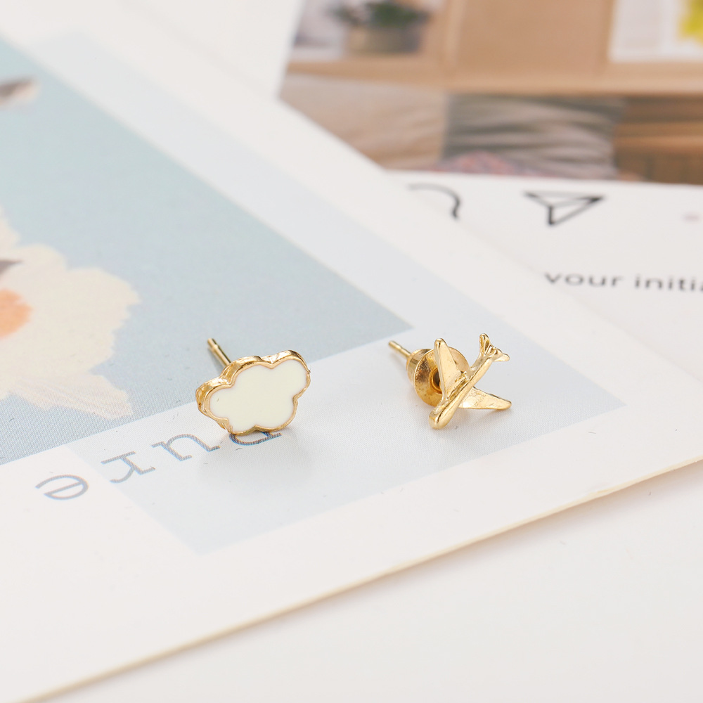 Han Zhishang's independent station features cute cloud, airplane, small ear studs, cross-border creative, sweet and oil-dripping white ear studs for women from Europe and America Application Scenario