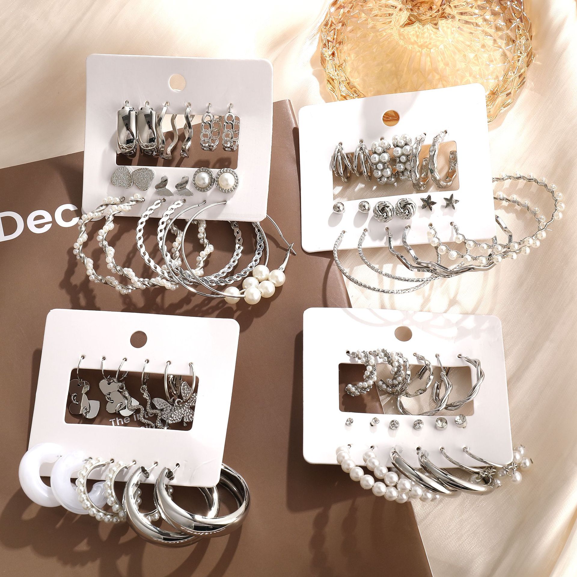 Amazon Cross-border best-selling heart-shaped butterfly imitation pearl earring set, a fashionable and elegant high-end earrings set for women Application Scenario