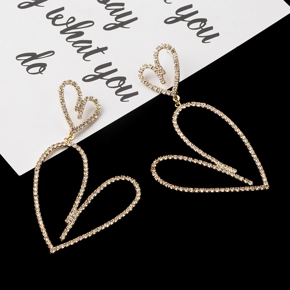 S925 Silver needle Dongdaemun Full Diamond hollowed-out long heart-shaped stud earrings with exaggerated hearts, European and American cold style earrings for women details Picture