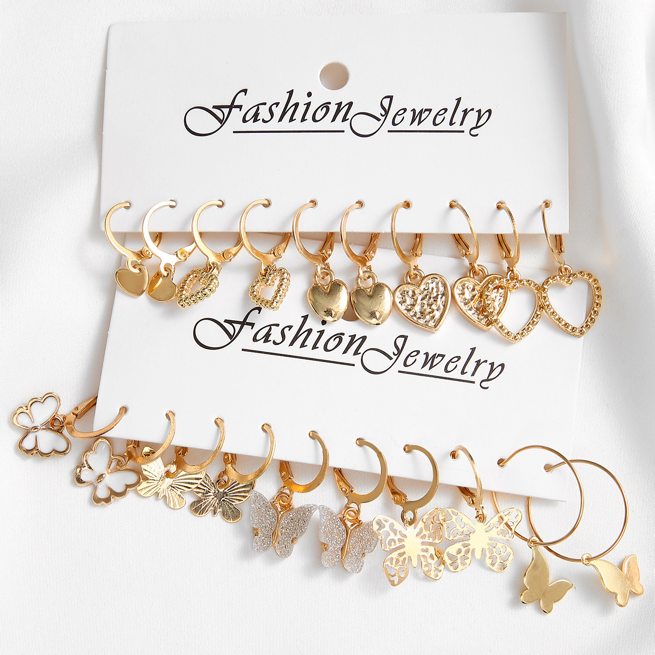 A 10-piece set of creative, retro and simple hollowed-out heart-shaped golden butterfly ear buckles from Europe and America Application Scenario
