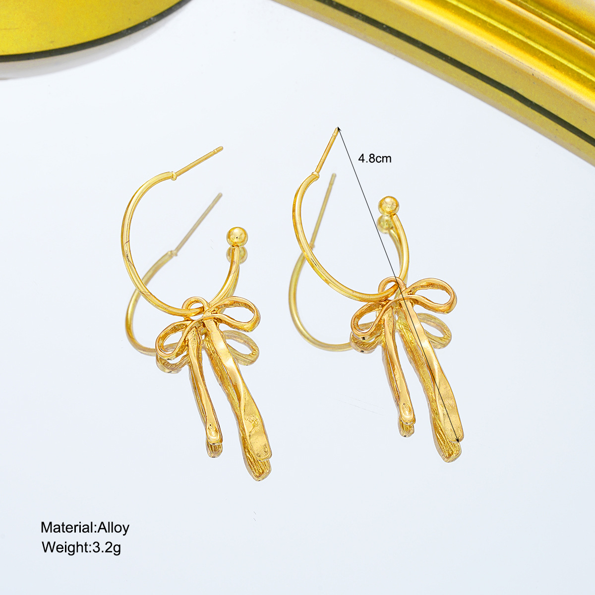 New, simple, niche, creative and elegant bow tassel earrings from Europe and America, a fashionable and high-end accessory for women Specification drawing
