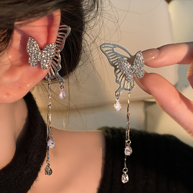 Sweet and cool butterfly tassel ear bone clips, a niche design for women without ear holes, new front and back round face earrings for 2024 full figure