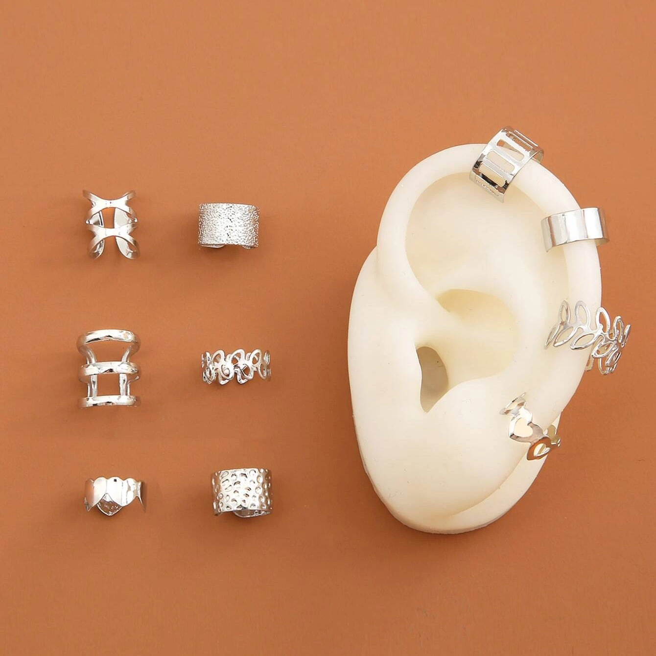 10 pieces of the new high-end design no-ear piercing ear bone clip earrings with a female personality, featuring golden leaf cutout C-shaped ear clips full figure