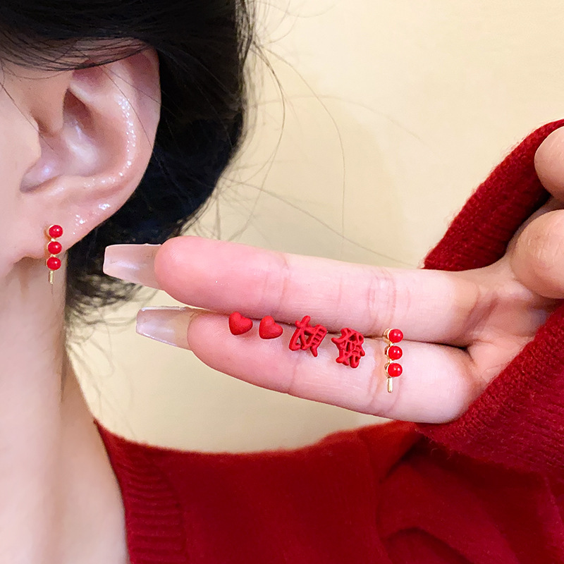 A small set of traditional Chinese style ear-nourishing stud earrings, versatile and festive earrings for women to make money, 925 silver needle, high-end and elegant accessories Application Scenario